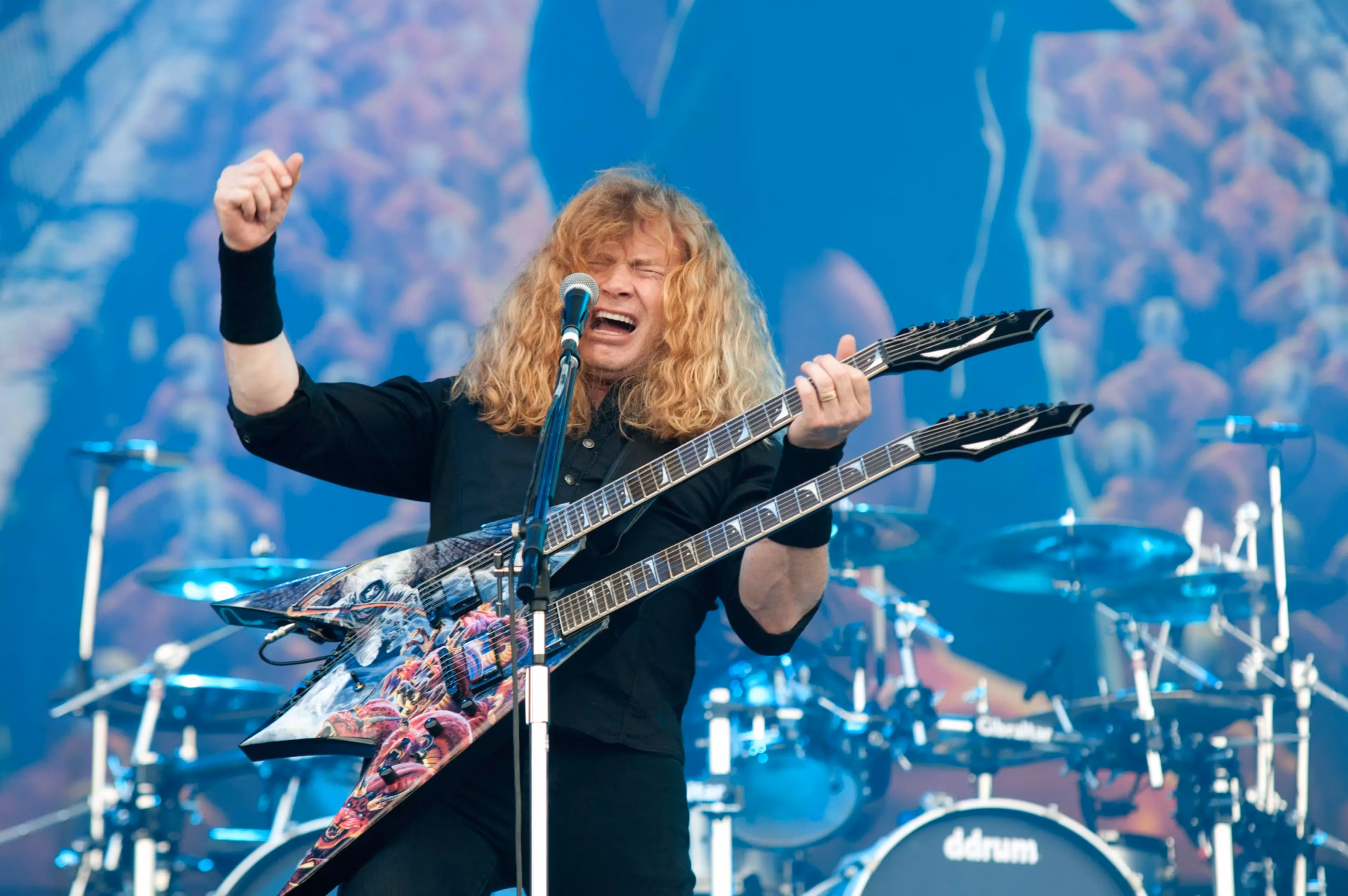 FYI/TMI: Men’s Wearhouse Apologizes To Dave Mustaine, U.S. Album Sales Drop