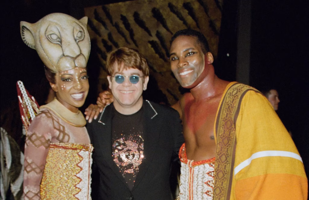 Elton John with Lion King Broadway cast in 1999