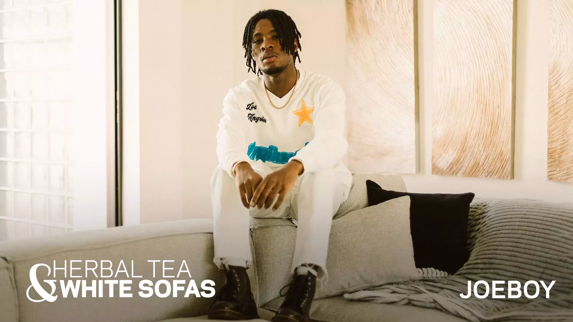 Why Joeboy Calls Nigerian Jollof Rice “The Best Food In The World” | Herbal Tea & White Sofas