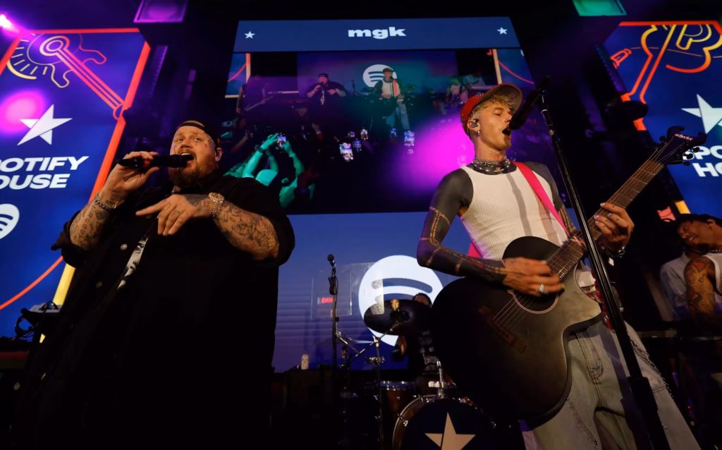 Machine Gun Kelly and Jelly Roll performing in 2024
