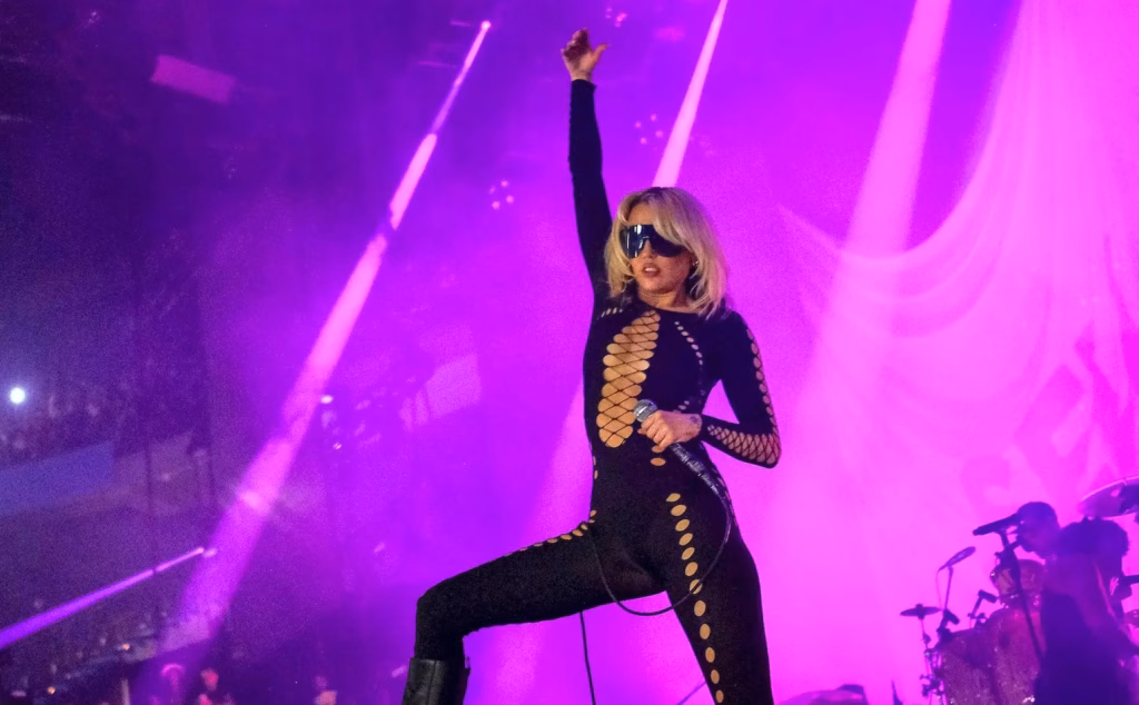 Miley Cyrus performing in 2022