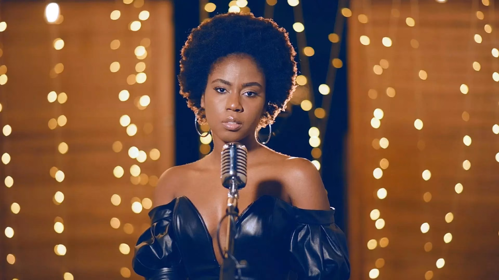 Press Play At Home: Watch MzVee Perform An Elegant Version Of ​​”Coming Home,” Complete With Twinkling Lights