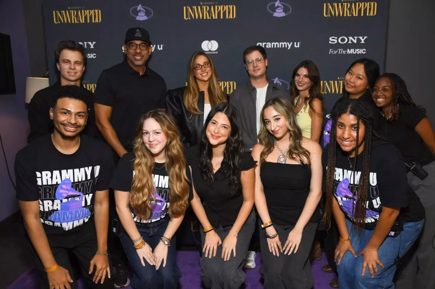 Tate McRae poses with GRAMMY U Reps 