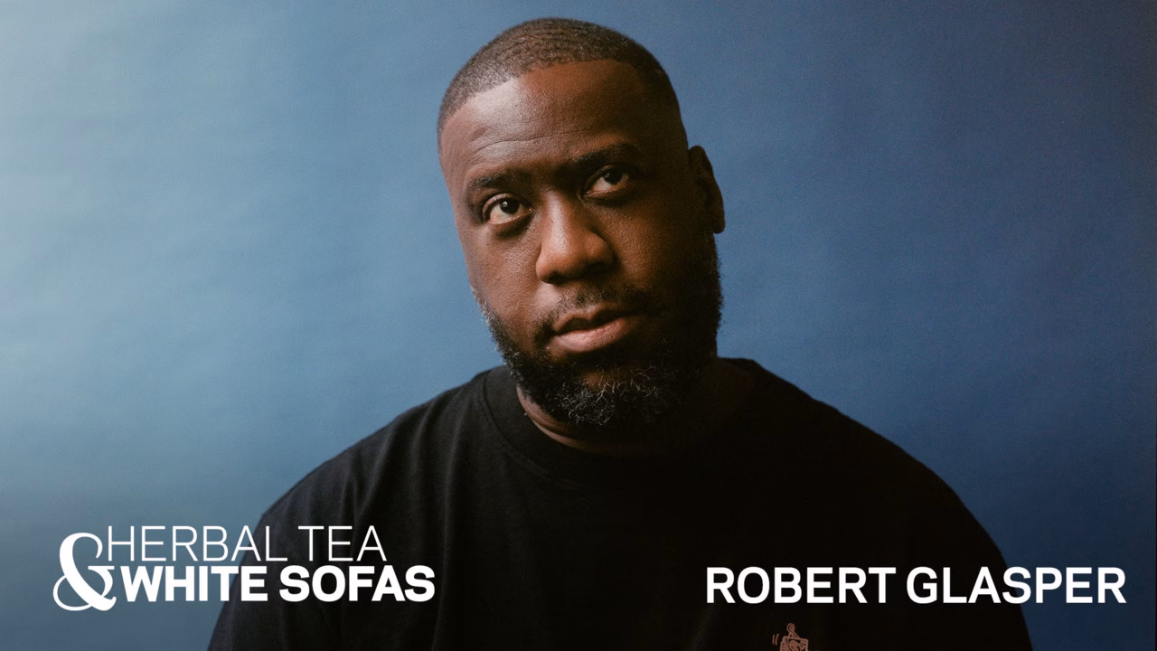 Watch Robert Glasper Discuss The Peculiar Fruits He Has Received | Herbal Tea & White Sofas