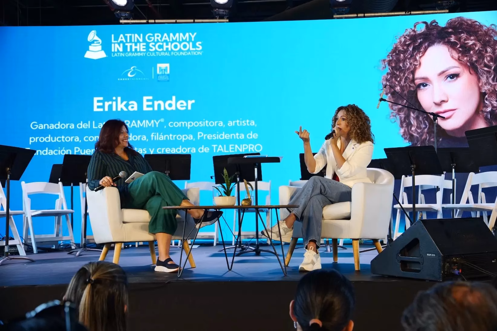 Erika Ender (R) speaks at a Latin GRAMMY In The Schools event, presented by the Latin GRAMMY Cultural Foundation in partnership with Fundación Puertas Abiertas, at Panama's Ciudad de las Artes on Tuesday, July 22, 2025