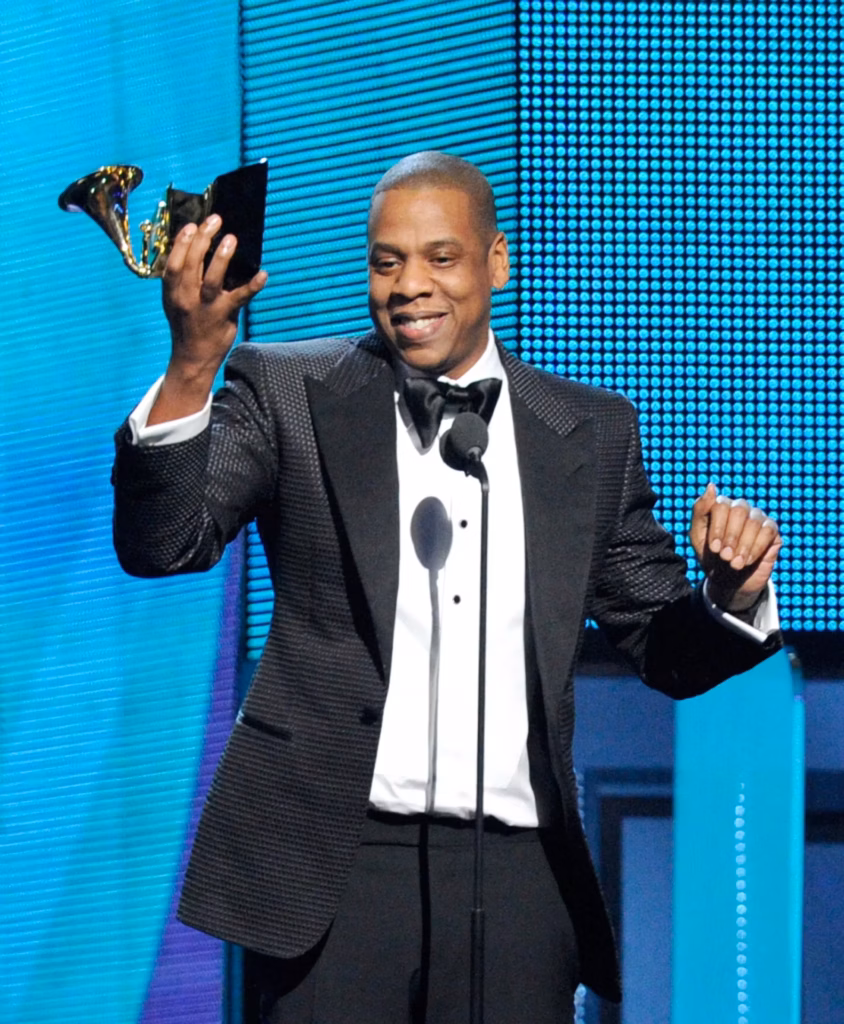 Jay Z holds a GRAMMY