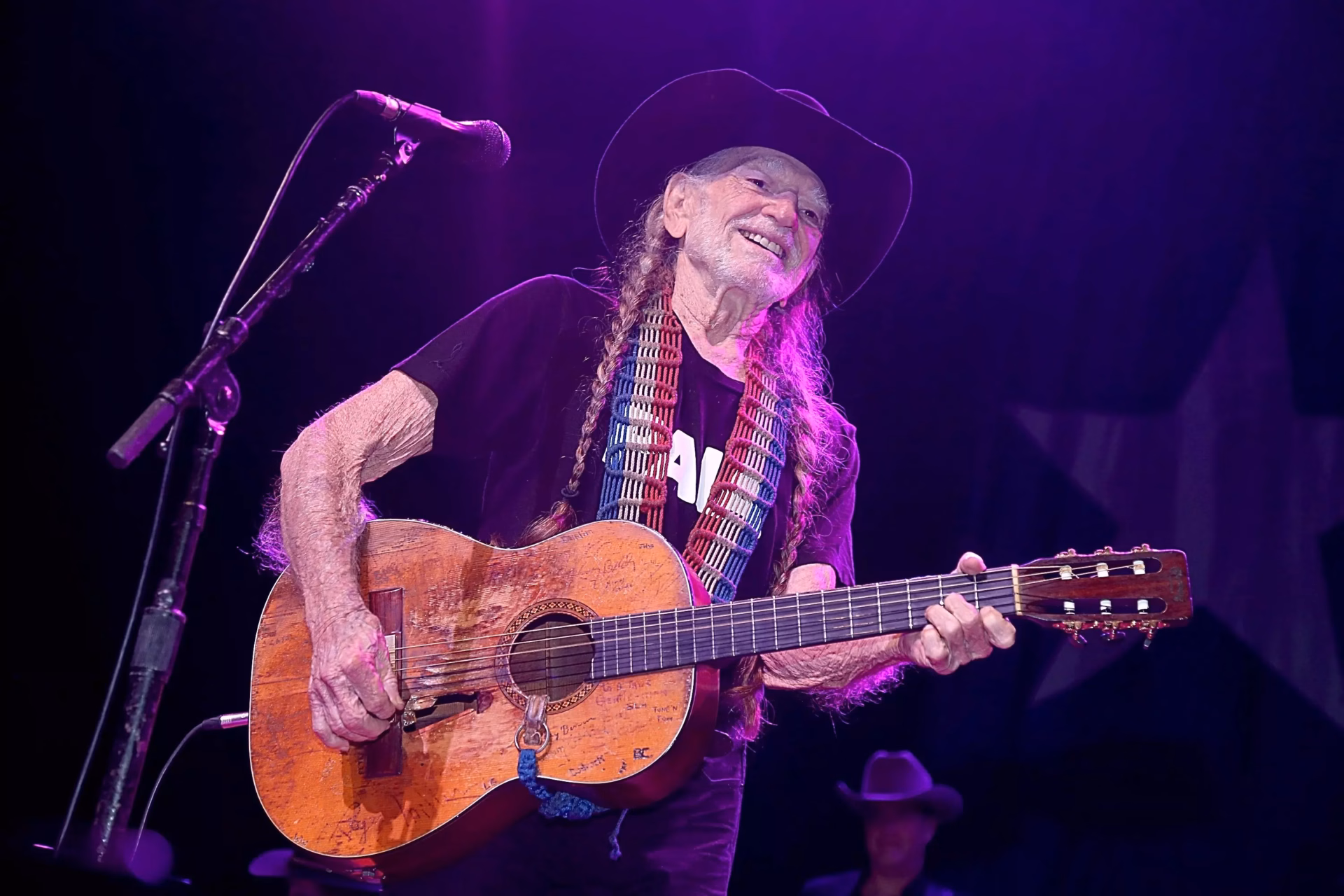 Watch: Repairing Willie Nelson’s Beloved Guitar “Trigger”