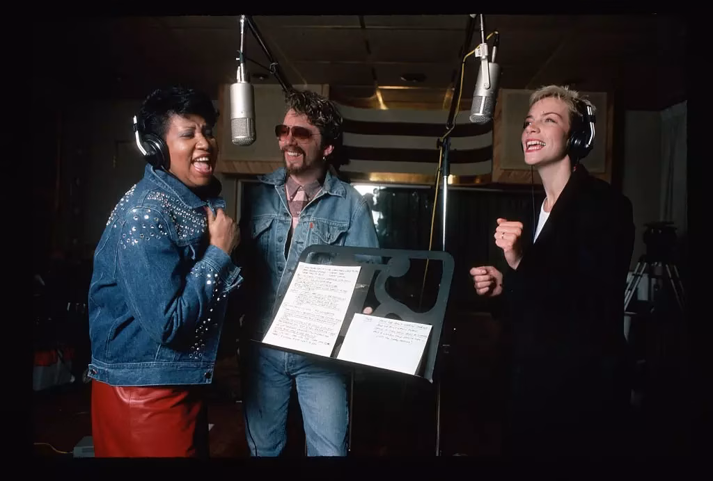 Aretha Franklin and Annie Lennox and Dave Stewart of the Eurythmics