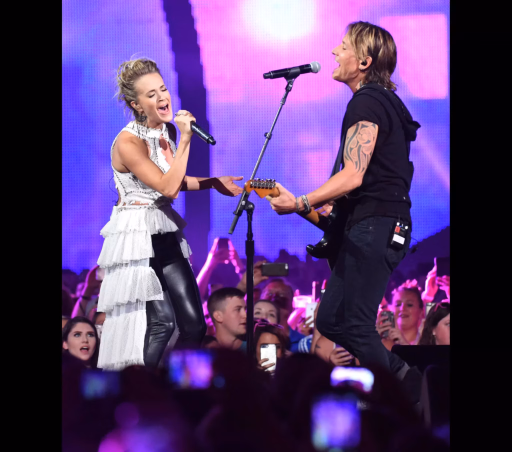 Carrie Underwood and Keith Urban perform at the 2017 CMT Awards