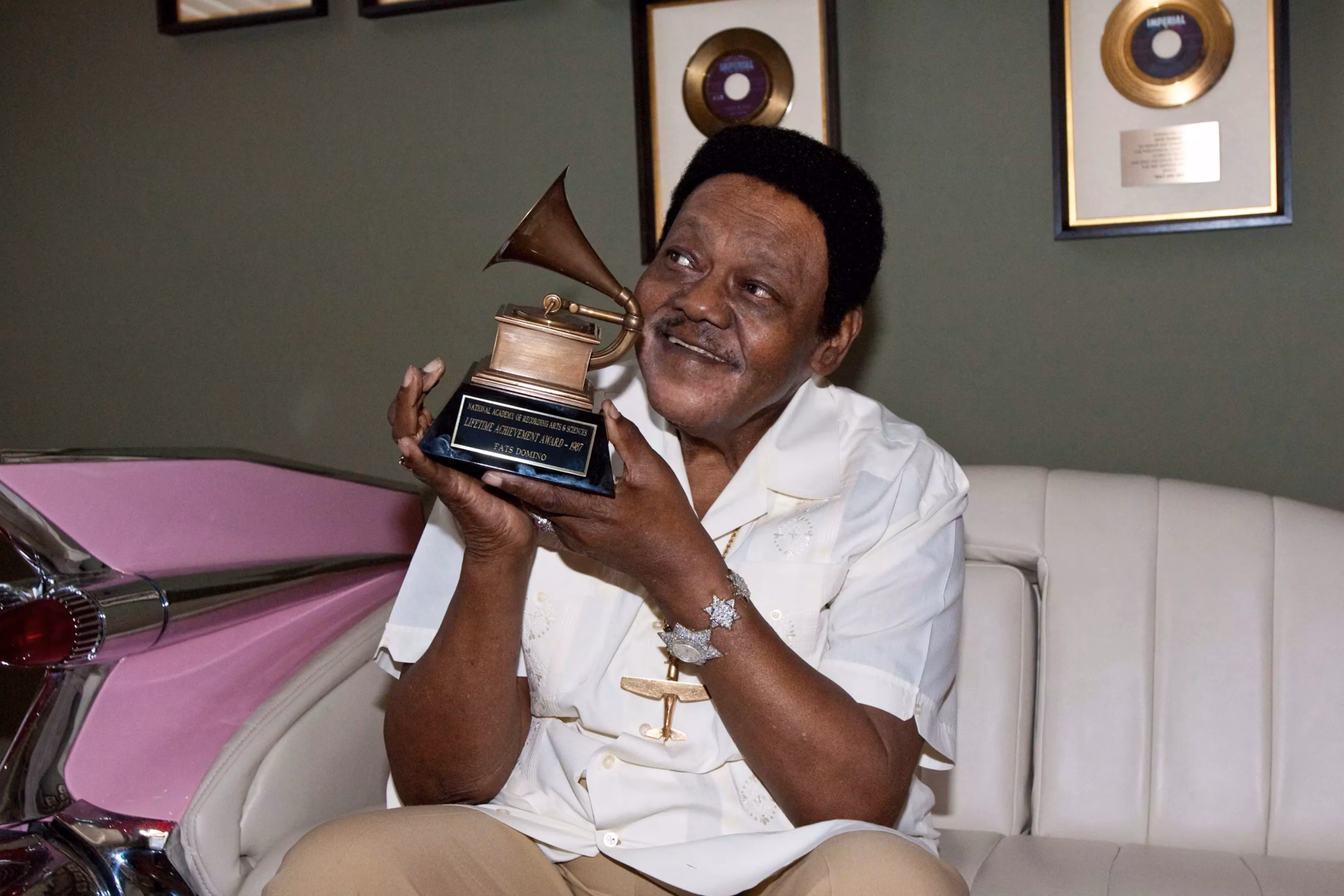 Fats Domino holds his Recording Academy Lifetime Achievement Award
