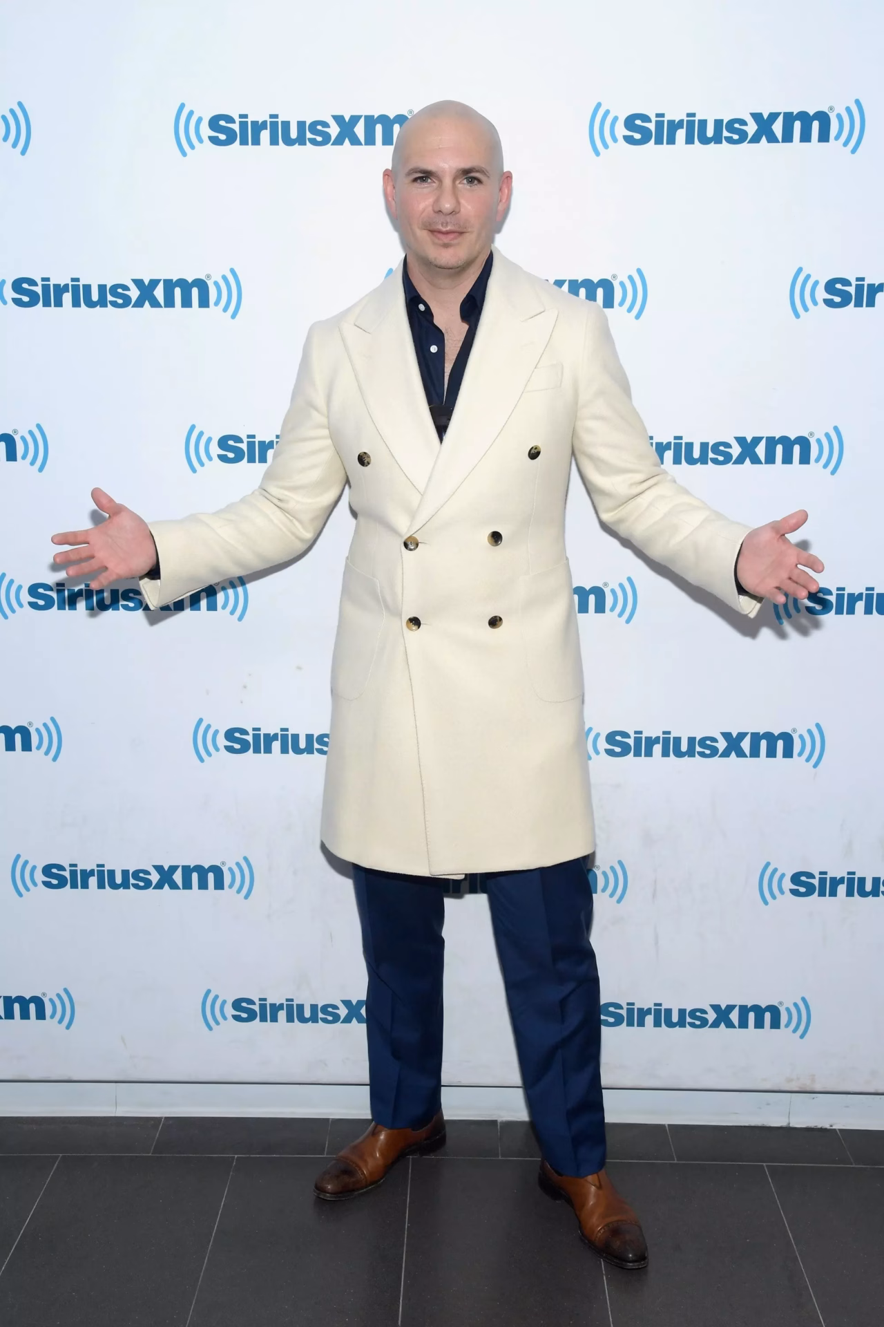 Pitbull Plots 2019 World Tour Featuring Motivational Speaker Tony Robbins