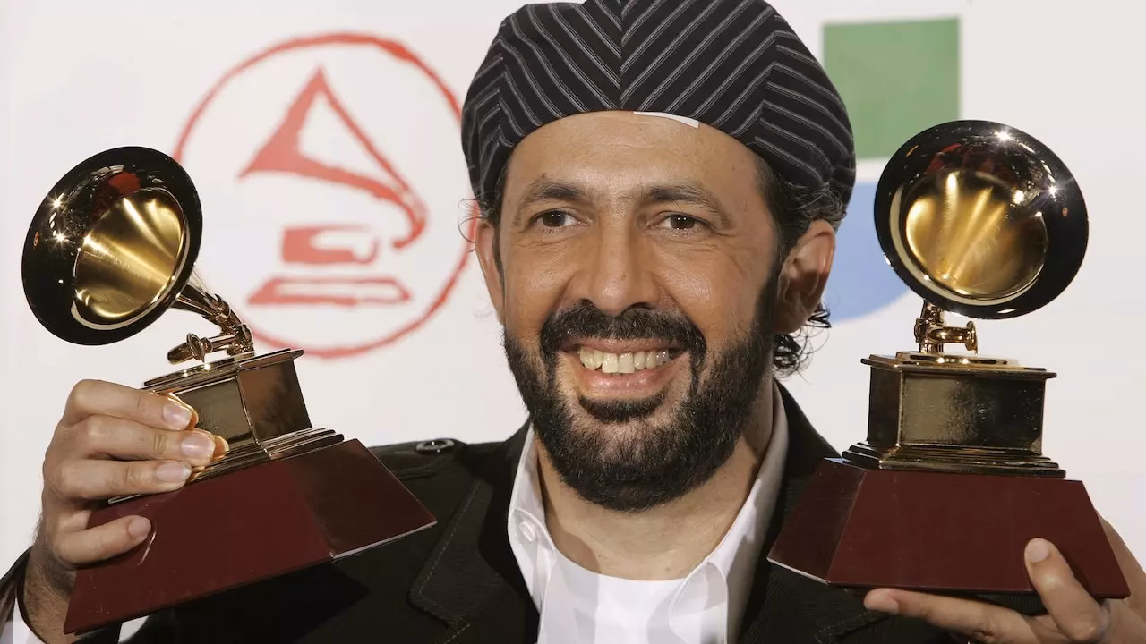 GRAMMY Rewind: Relive Juan Luis Guerra’s Latin GRAMMY Win For Best Tropical Song For “Las Avispas” In 2005