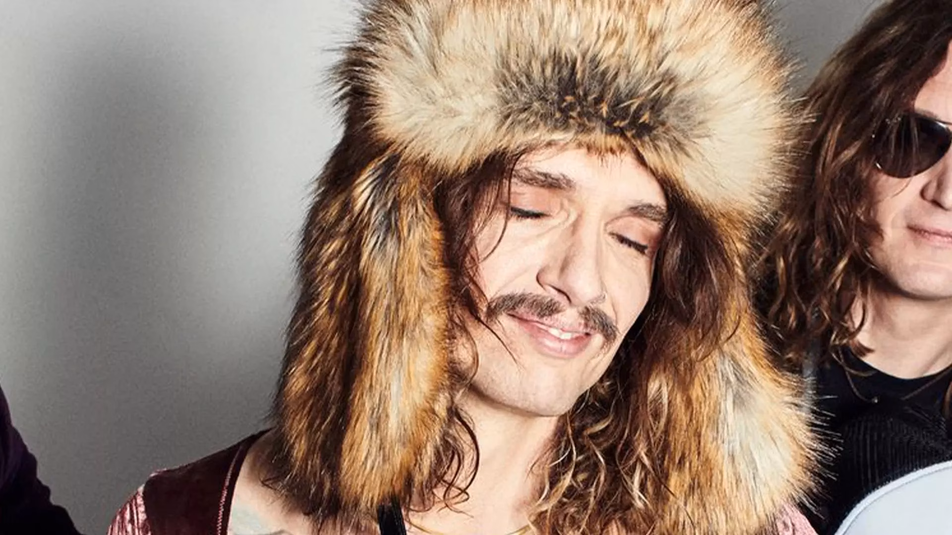 Herbal Tea & White Sofas: Watch The Darkness’ Justin Hawkins Explain His Backstage Proclivity For Ginger