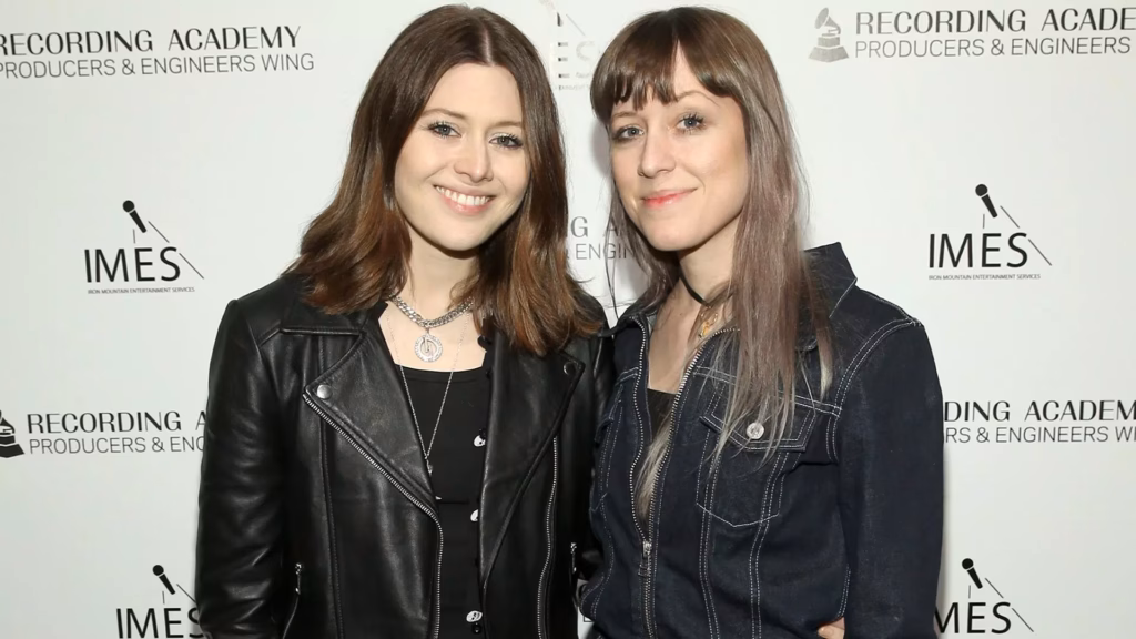 Larkin Poe pose at a Recording Academy event