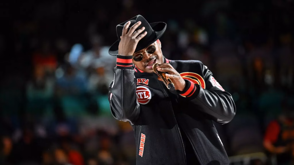 Ne-Yo performs onstage during halftime at the game between the Brooklyn Nets and the Atlanta Hawks at State Farm Arena on February 26, 2023 in Atlanta, Georgia