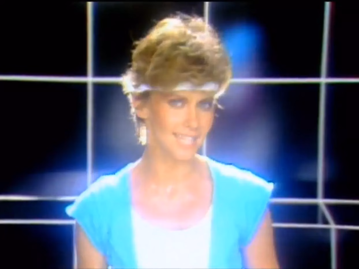 Olivia Newton-John Gets Physical