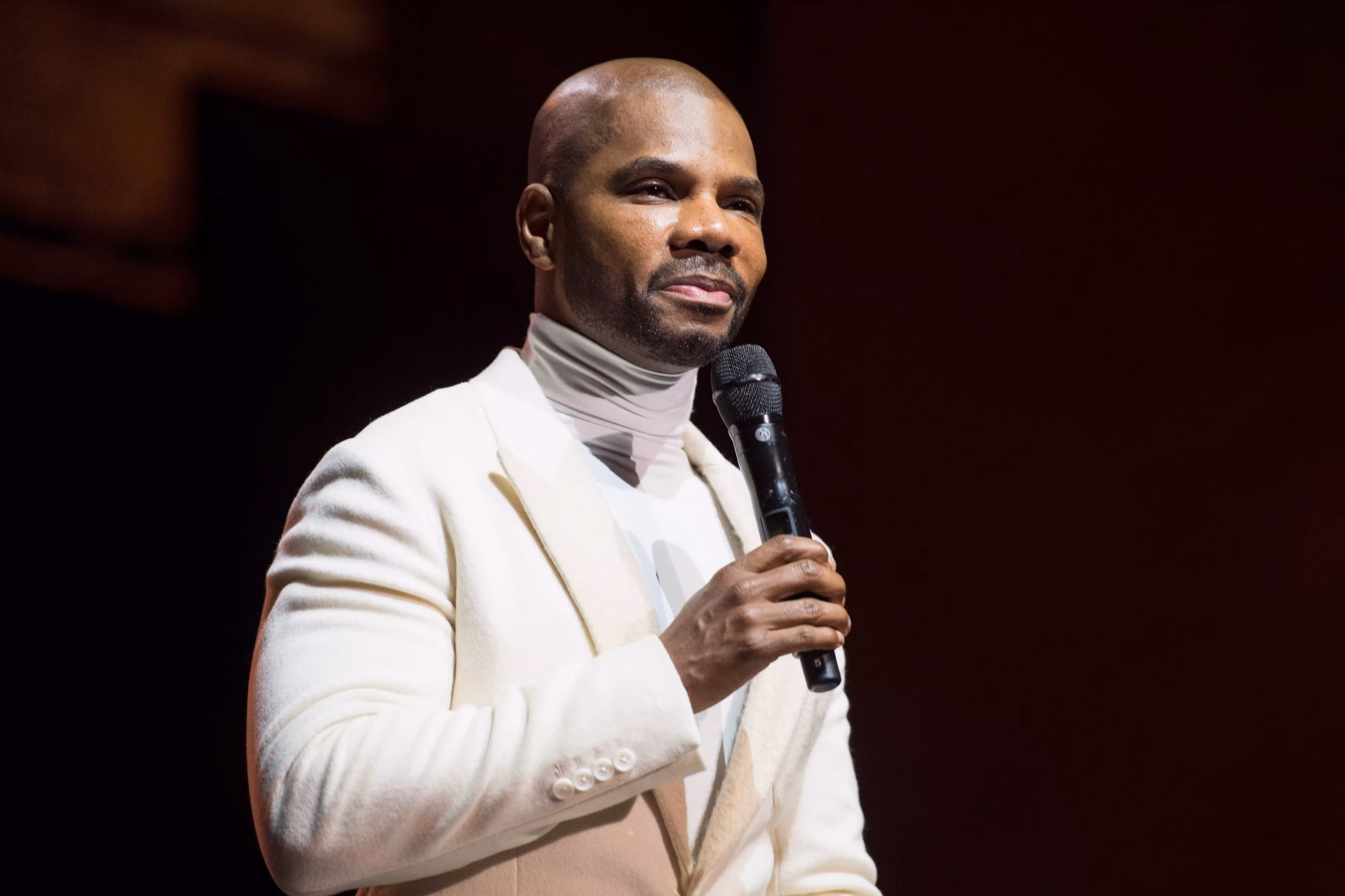 Kirk Franklin speaks onstage in 2017